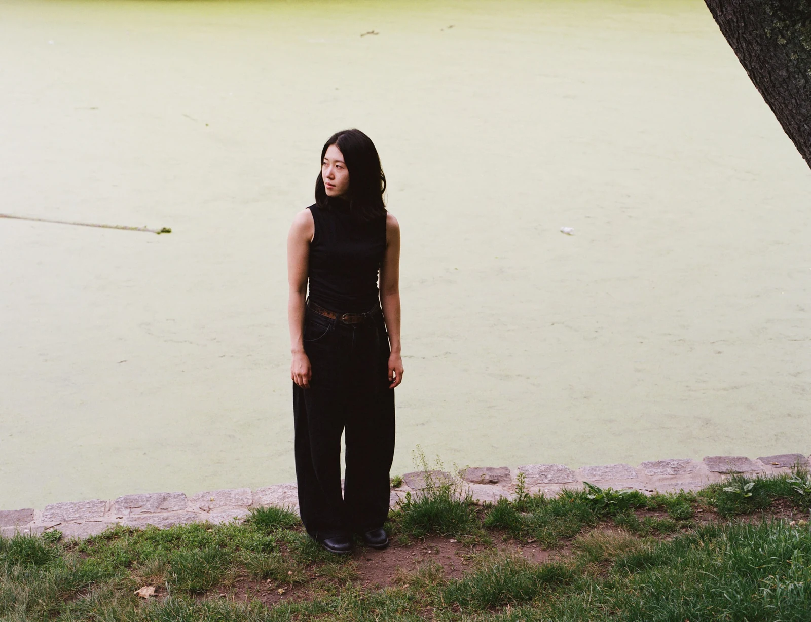 Erika Toda standing beside a pond